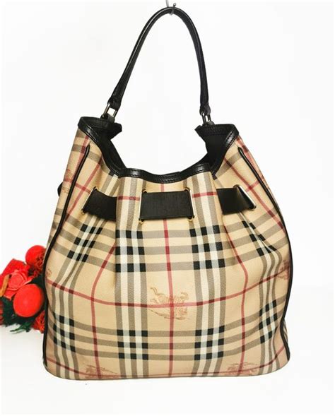 borsa a spalla pioggia burberry|Burberry Limited.